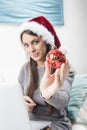 Santa woman doing online shopping Royalty Free Stock Photo