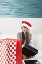 Santa woman doing online shopping Royalty Free Stock Photo