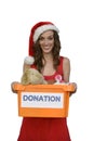 Santa woman holding christmas toy donation box Royalty Free Stock Photo