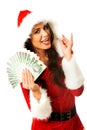 Santa woman holding a clip of polish money Royalty Free Stock Photo