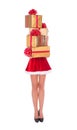 Santa woman with slender legs and golden christmas gifts isolate