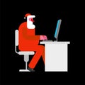 Santa working at computer. Christmas grandfather and pc.