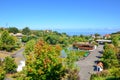 Santana, Madeira, Portugal - Sep 24, 2019: View of the Madeira Theme Park. Green trees, lake, houses and walking paths. Exhibition