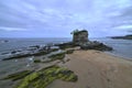 Santander, Spain, August 2022. Rock on the Playa del Camello Neptune child