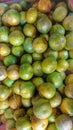 Santang honey oranges, a local Indonesian fruit. background of fresh green oranges