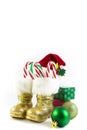 Santas golden boots and red hat with presents Royalty Free Stock Photo