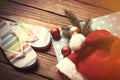 Santas hat and christmas bubbles with flip flops Royalty Free Stock Photo