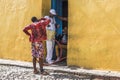 Santeria man and friends in Trinidad