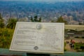 SANTIAGO, CHILE - OCTOBER 16, 2018: Informative sign of description of Statue of the Virgin Mary on the top of the San