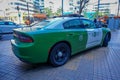 SANTIAGO, CHILE - OCTOBER 16, 2018: Outdoor view of green Police carabineros car parked in the city streets