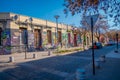 SANTIAGO, CHILE - SEPTEMBER 13, 2018: Cars parked at one side of the street in the Barrio Yungay in Santiago, capital of