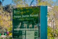 SANTIAGO, CHILE - SEPTEMBER 13, 2018: Outdoor view of informative sign of Park Quinta Normal over a green structure in