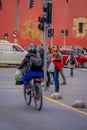 SANTIAGO, CHILE - SEPTEMBER 13, 2018: Unidentified man riding his blue motorcycle with many people waiting the green