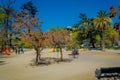 SANTIAGO, CHILE - SEPTEMBER 17, 2018: Unidentified people walking in the sandy playground at Forestal park located in Royalty Free Stock Photo