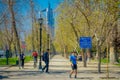 SANTIAGO, CHILE - SEPTEMBER 13, 2018: Unidentified tourists biking and walking in a sunny day for relaxing in the