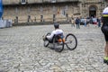 Santiago de Compostela, La Coruna, Galicia, Spain - 13 June, 2023. Pilgrim with disability arriving at Santiago de Compostela
