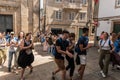 Santiago de Compostela, Spain. august 5, 2022: thousands of young pilgrims dance in arrive in Santiago