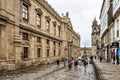 Santiago de Compostela, Spain - Jun 19, 2023: Pilgrims in front of the Cathedral at Santiago de Compostela, Spain