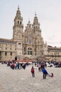 Santiago de Compostela cathedral facade . View from obradoiro square with groups of pilgrims and tourists