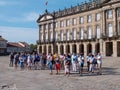 SANTIAGO DE COMPOSTELA, SPAIN - September 13, 2020: Tourists make photo of the Cathedral on the Obradoiro square in the Santiago