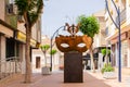 SANTIAGO DE LA RIBERA, SPAIN - JUNE 12, 2022 The sculpture depicts a carnival mask, topped by three seahorses, the distinctive Mar Royalty Free Stock Photo