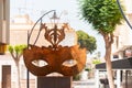 SANTIAGO DE LA RIBERA, SPAIN - JUNE 12, 2022 The sculpture depicts a carnival mask, topped by three seahorses, the distinctive Mar Royalty Free Stock Photo