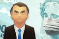 Santo AndrÃÂ©/SÃÂ£o Paulo/Brazil - April 10, 2020: Brazilian president, Jair Bolsonaro and masked BRL banknote face