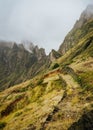 Santo Antao, Cape Verde. Mountain ridge with foggy clouds above on hike rout 303 to Xoxo in the Ribeira da Torre valley Royalty Free Stock Photo