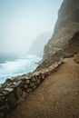 Santo Antao, Cape Verde - Sandy trail hike path from Cruzinha da Garca to Ponta do Sol. Moody Atlantic coastline with