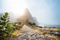 Santo Antao Island, Cape Verde. Epic Mountain peak on stony hiking path to Ponta do Sol over arid Aranhas valley with