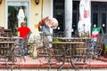 SANTO DOMINGO, DOMINICAN REPUBLIC - AUGUST 8, 2017: Elegant wrought iron chairs in a city cafe. Close-up.