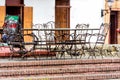 SANTO DOMINGO, DOMINICAN REPUBLIC - AUGUST 8, 2017: Elegant wrought iron chairs in a city cafe. Copy space for text.