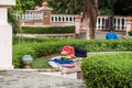 SANTO DOMINGO, DOMINICAN REPUBLIC - AUGUST 8, 2017: A man is sleeping on a bench in a city park. Copy space for text.