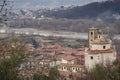 Santo Stefano Magra in Lunigiana area of Italy in La Spezia province. Church, houses and River Magra. Wintry day.