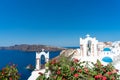 Santorini caldera with famous old white orthodox church Royalty Free Stock Photo
