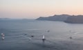 Santorini caldera view from the top of the hill. Blue sky and water. Royalty Free Stock Photo