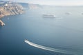 Santorini caldera view from the top of the hill. Blue sky and water. Royalty Free Stock Photo