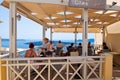 SANTORINI,FIRA-JULY 28: Local restaurant with volcano view on July 28,2014 in Fira town on the Santorini island, Greece.