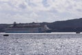 Large white passenger cruise liner in the old port of the Greek city of Fira. Liner on the Royalty Free Stock Photo