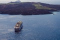 Santorini, Greece, April 2019. Large white passenger cruise liner in the old port of the Greek city of Fira. Liner on the