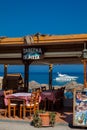 Waterfront restaurants at the beautiful Perissa beach in Santorini Island