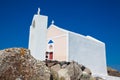 Young tourist girl visiting a beautiful small church next to the walking path between Fira and Royalty Free Stock Photo