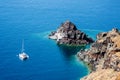 A Catamaran Anchored Off the Coast of Santorini, Greece.