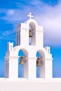 Santorini Greece Church crosses and bells against blue sky Royalty Free Stock Photo