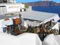 Santorini, Greece, donkeys, local transport, greek man, sea Royalty Free Stock Photo