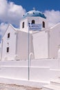 Santorini Greece Greek White Orthodox Church, Blue Dome and Cross Royalty Free Stock Photo