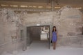 Santorini, Greece - June 13 2012: woman in Excavations of the ancient city of Akrokiti Royalty Free Stock Photo