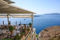 Greek seafront restaurant in Fira on Santorini Island. Cyclades, Greece