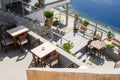 Greek seafront restaurant in Fira on Santorini Island. Cyclades, Greece