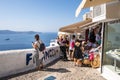 Seafront promenade in Fira, a largest town in Santorini with lots of restaurants and Royalty Free Stock Photo